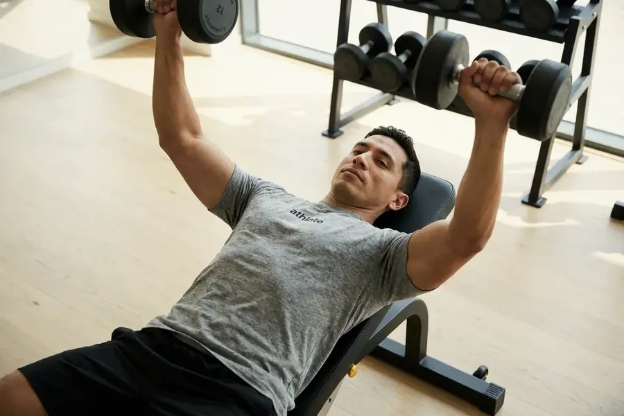 An athlate user mid full-body strength session.